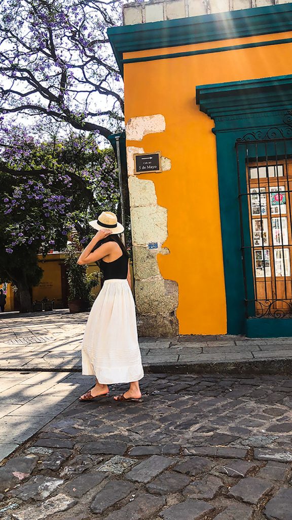 Oaxaca streets. Girl walking in Oaxaca streets