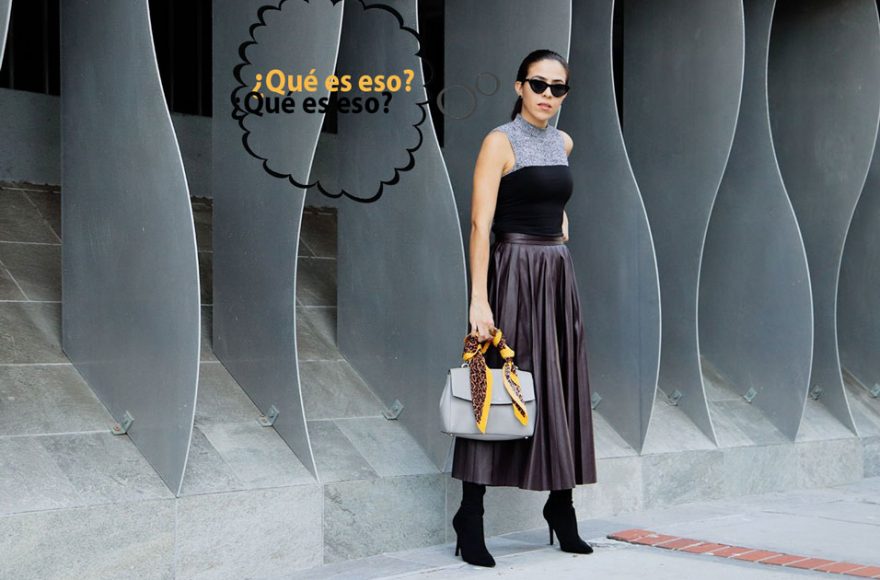 Girl wearing a skirt asking a question