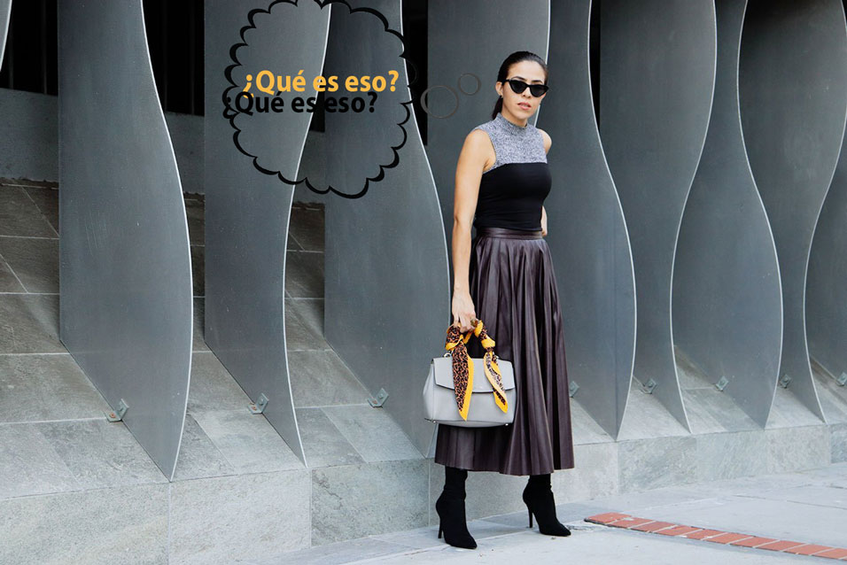 Girl wearing a skirt asking a question